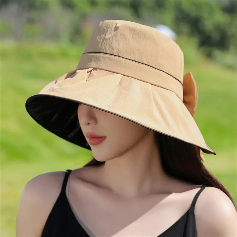 Cappello da sole con protezione UV, larghezza, versione coreana, dolce, cappello da sole per donne in estate, crema solare e versatile, cappello da bowknot