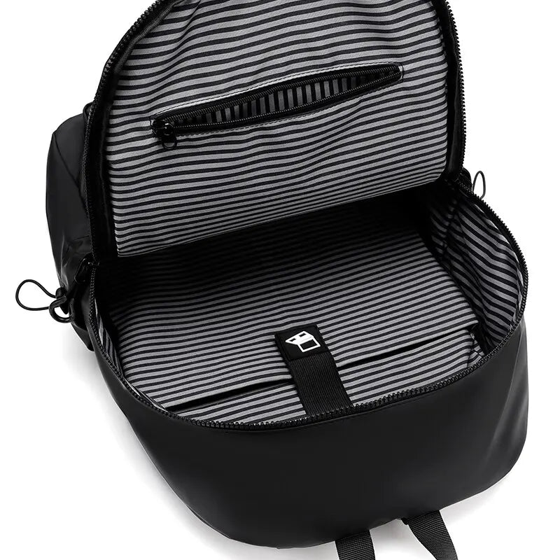 Uma mochila masculina de 14 polegadas de grande capacidade Viagem de lazer sólido colorido pu de mochila mochila de moda Moda e mulher bolsa escolar de estudantes