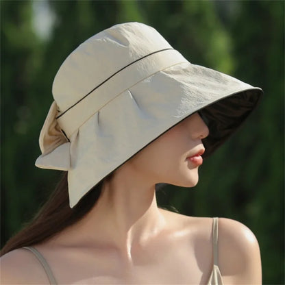 Cappello da sole con protezione UV, larghezza, versione coreana, dolce, cappello da sole per donne in estate, crema solare e versatile, cappello da bowknot