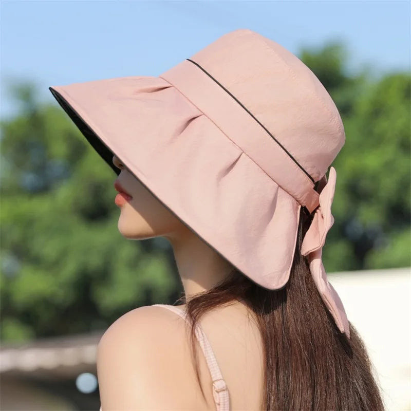 Cappello da sole con protezione UV, larghezza, versione coreana, dolce, cappello da sole per donne in estate, crema solare e versatile, cappello da bowknot