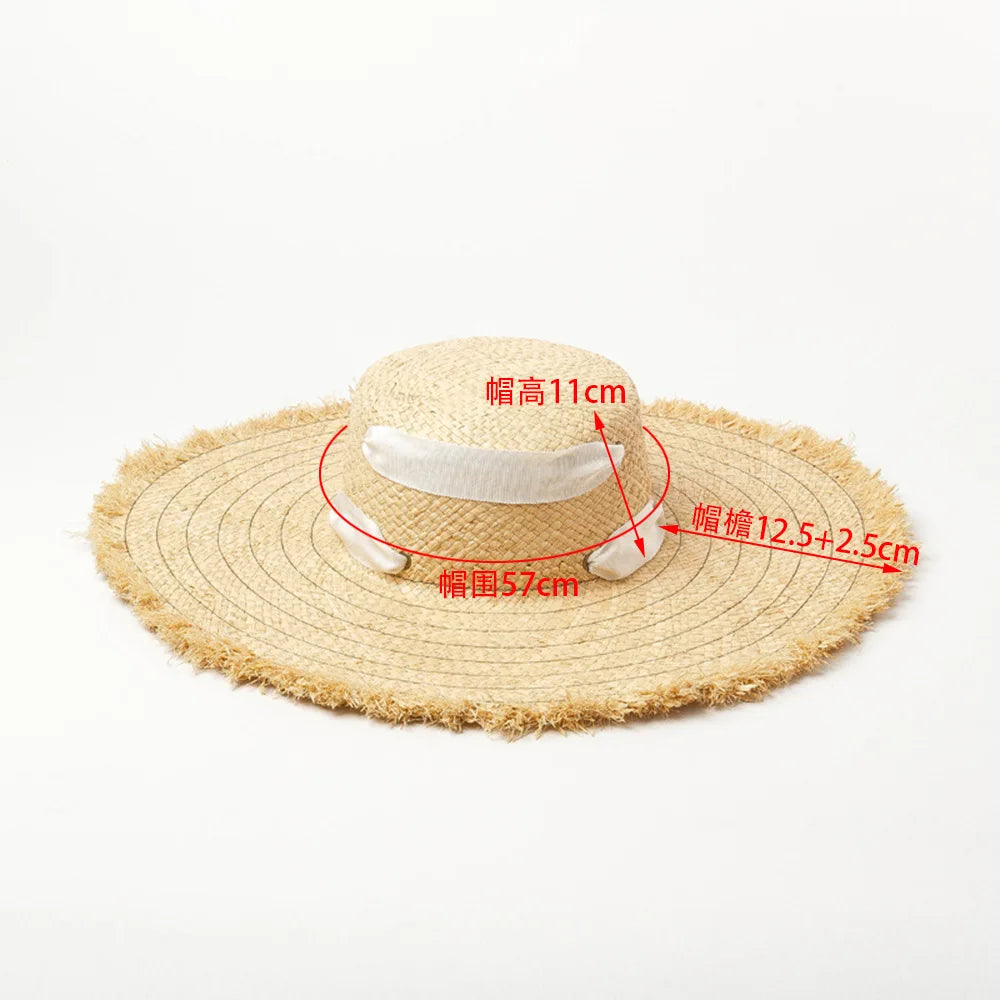 Naturlige Raffia Women Wide Brim Straw Hats Solshade Høy kvalitet Fedora Straw Hats Outdoor Travel Sand Bowknot Straw Hats